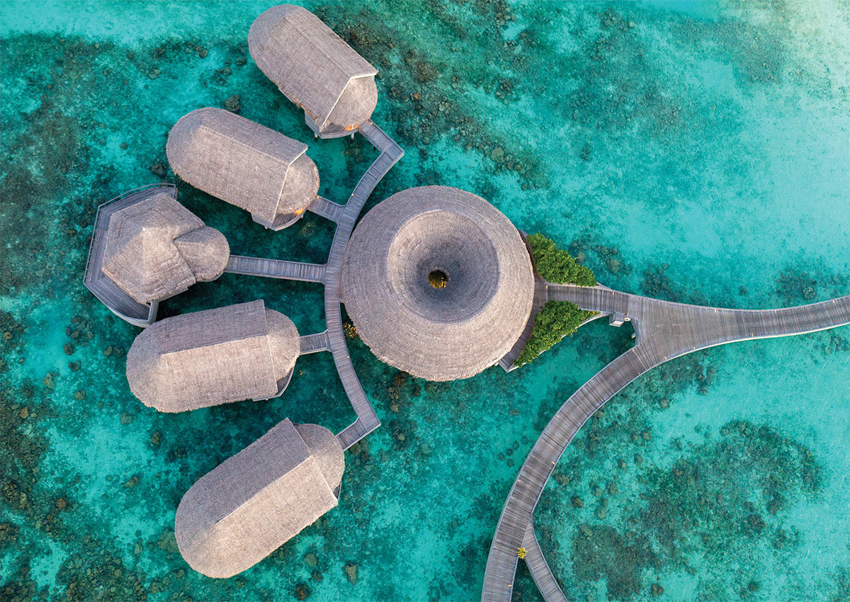 Top down aerial of the over water treatment rooms and reception of the Solasta Spa